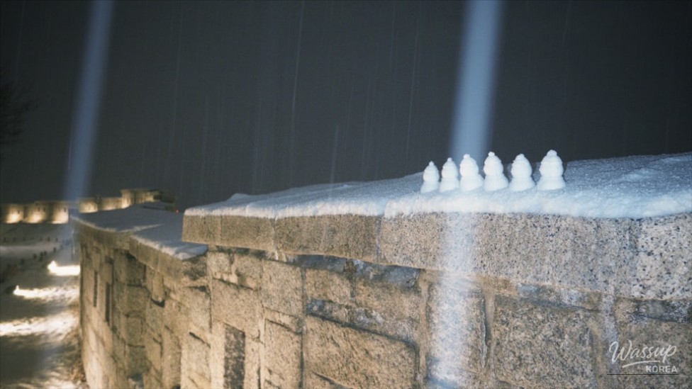 Stone steps with snow accumulation