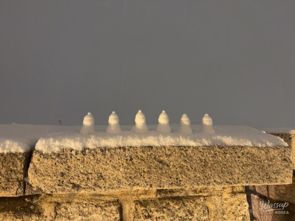Snow-covered viewpoint at night