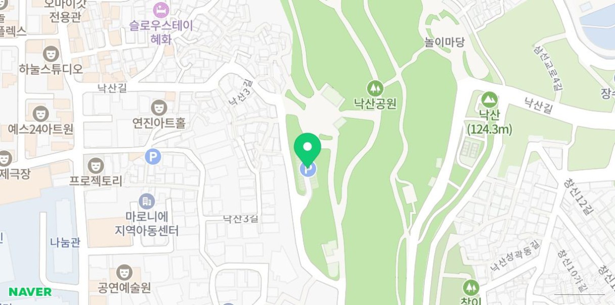 Stone walls of Naksan Park covered in snow