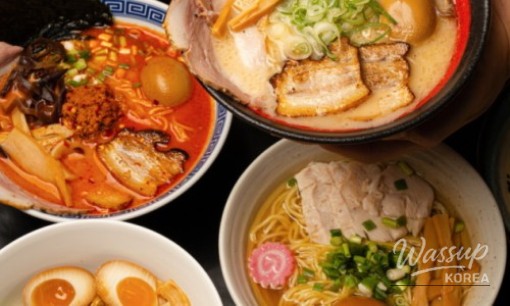 Detailed shot of broth clarity and toppings at Uchu Jin Ramen
