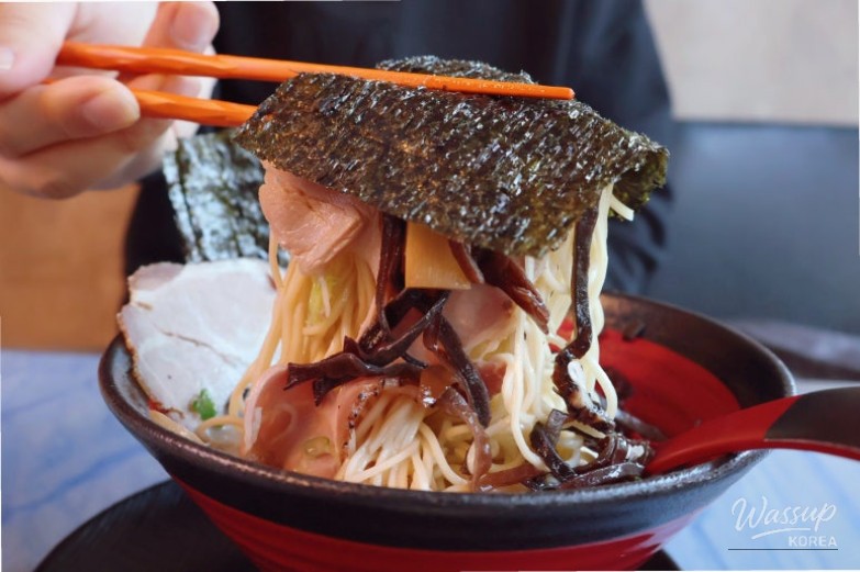 Steaming bowl of tonkotsu ramen served at Uchu Jin Ramen