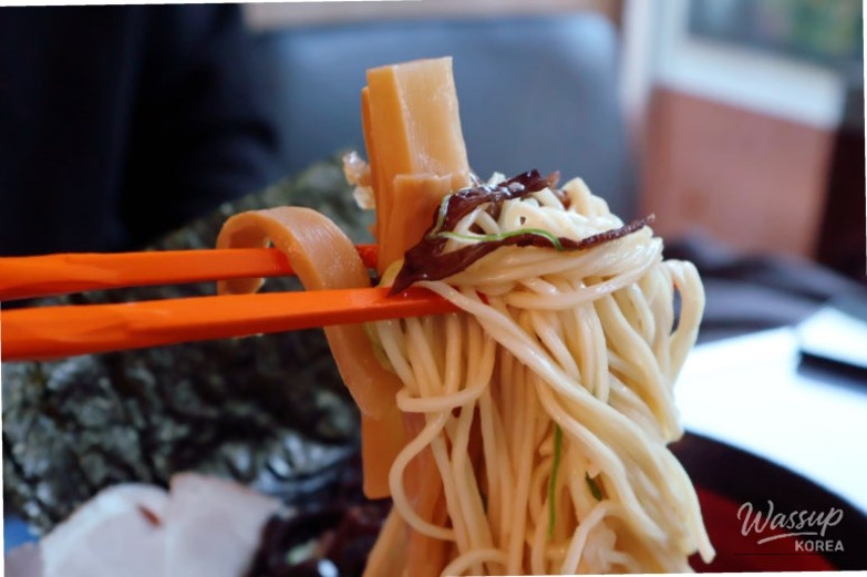 Quiet and cozy interior atmosphere of Uchu Jin Ramen designed for solo dining