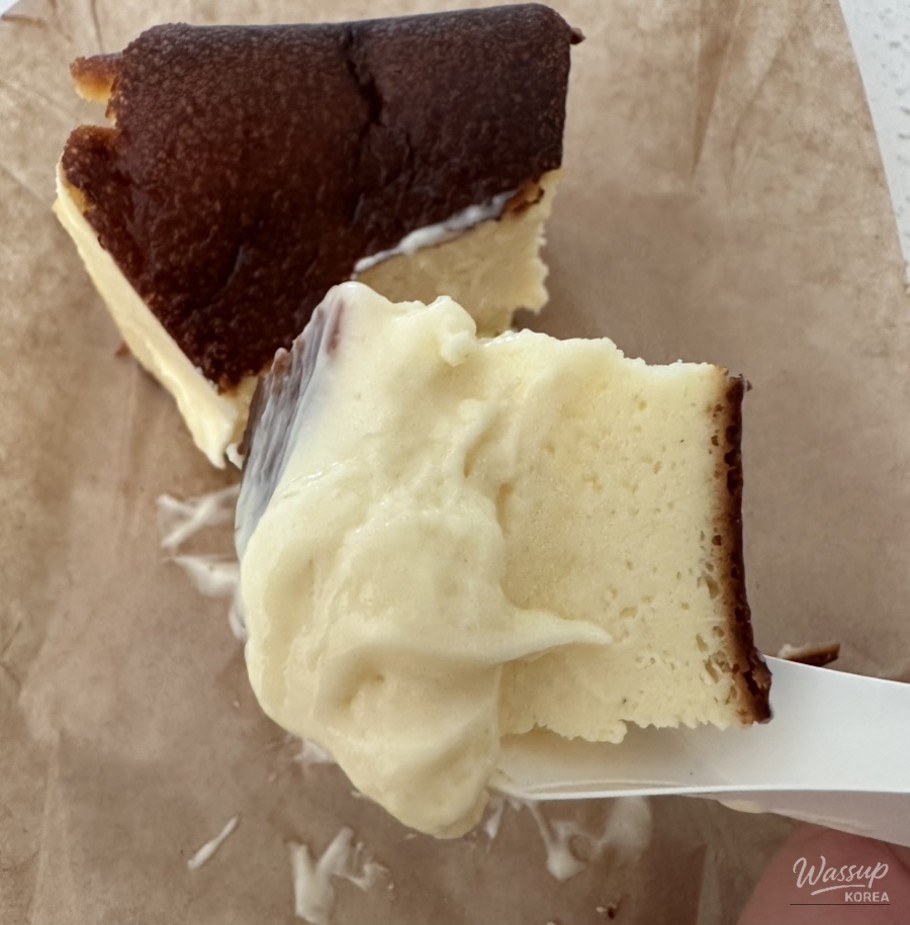 Another angle of the Basque cheesecake highlighting its baked surface