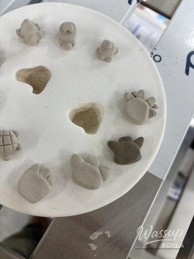 A comforting bowl of bone soup and kimchi at a familiar local restaurant near the office