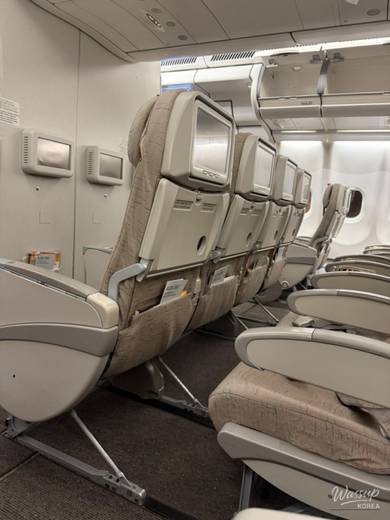First flight to the mainland with a wide view of the airplane cabin