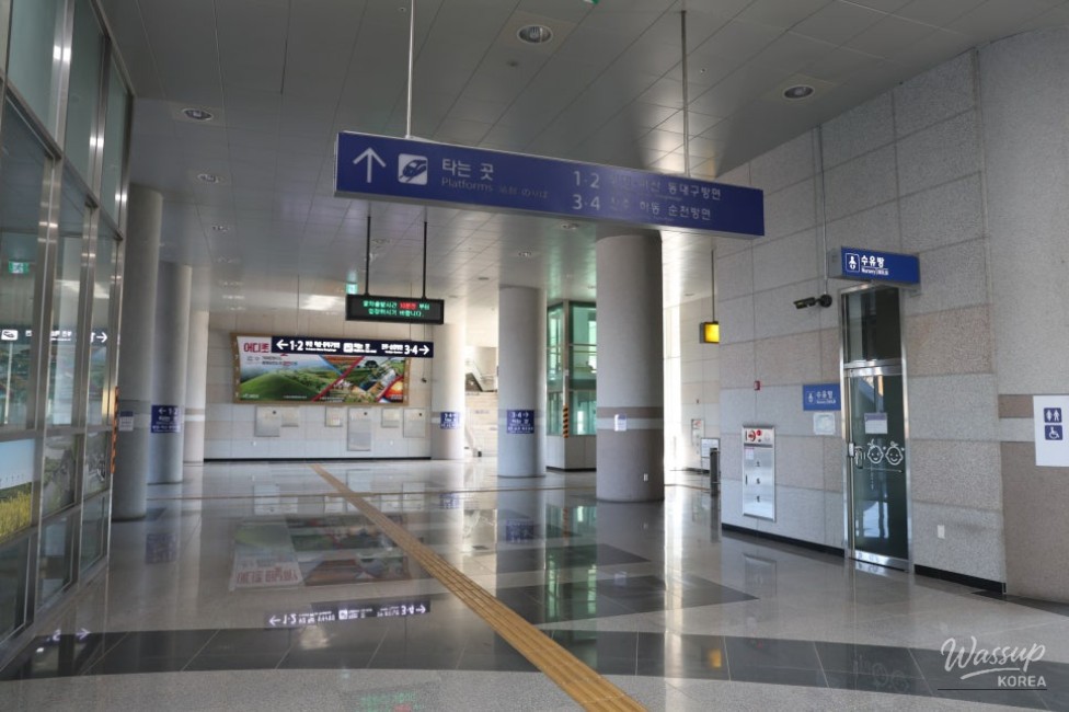 View of Gunbuk Station platform area with minimal passenger traffic