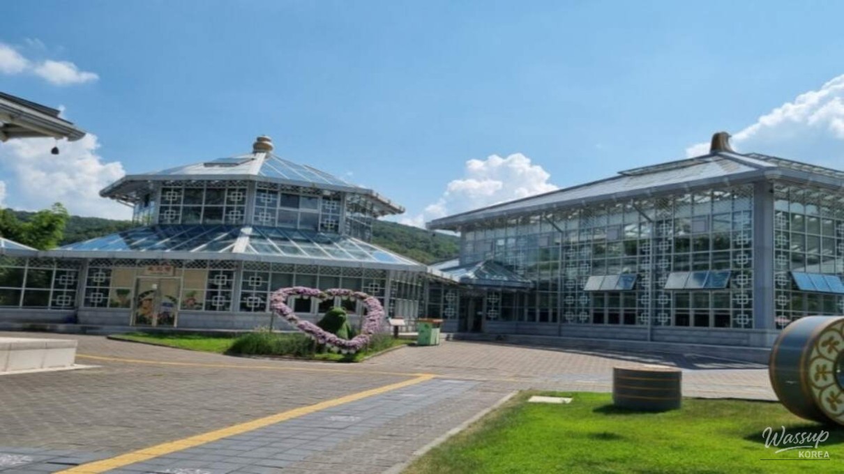 Glass greenhouse architecture inspired by traditional Silla-era hanok design at Gyeongju Donggungwon