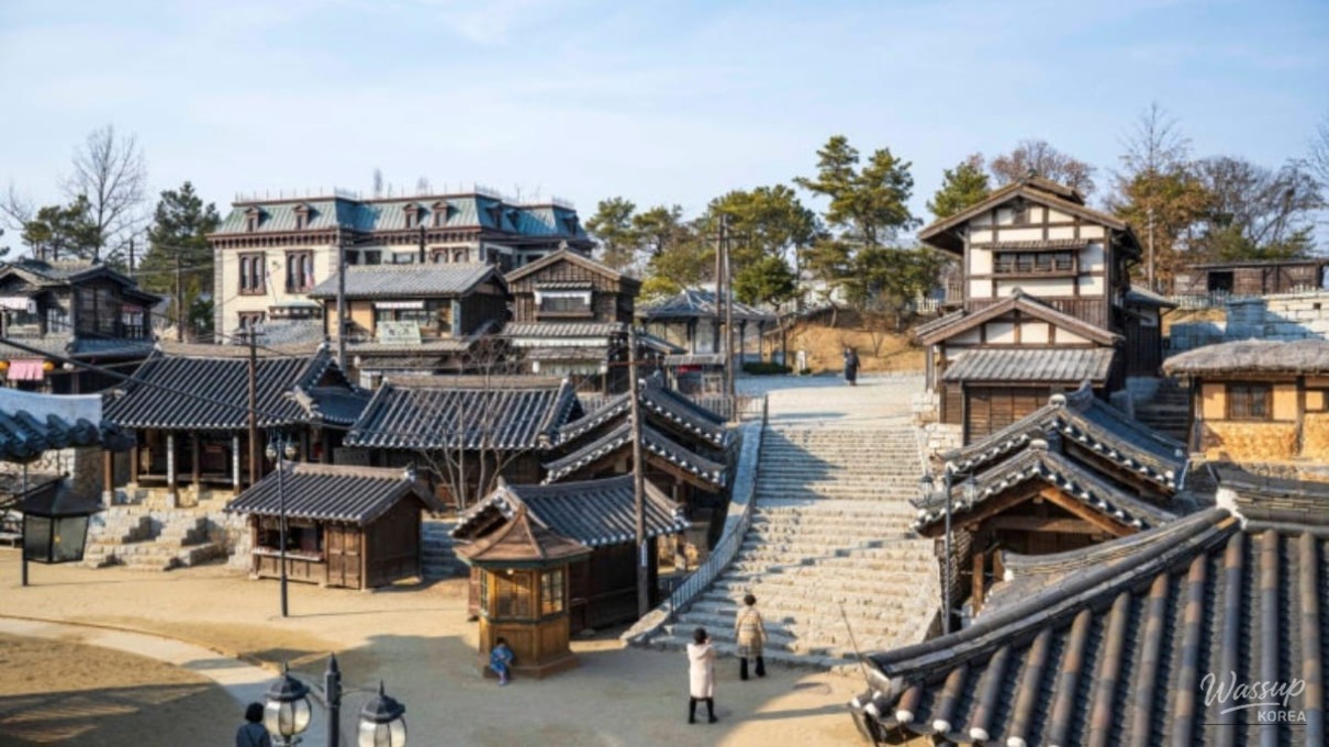 Snow-covered enlightenment-era street at Sunshine Studio with early 1900s Western-style buildings
