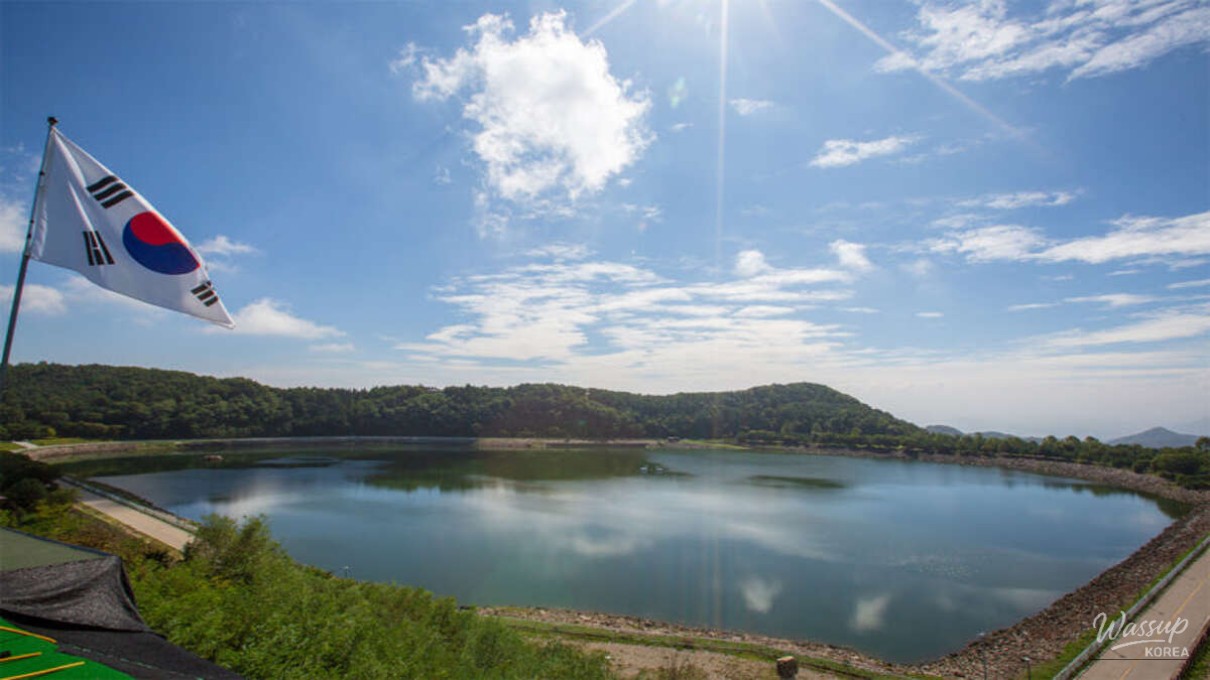 Flat lakeside walking trail at Homyeong Lake with winter scenery and calm surroundings