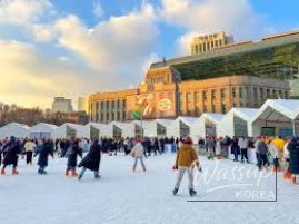Visitors ice skating at Seoul Plaza Ice Rink during the winter season