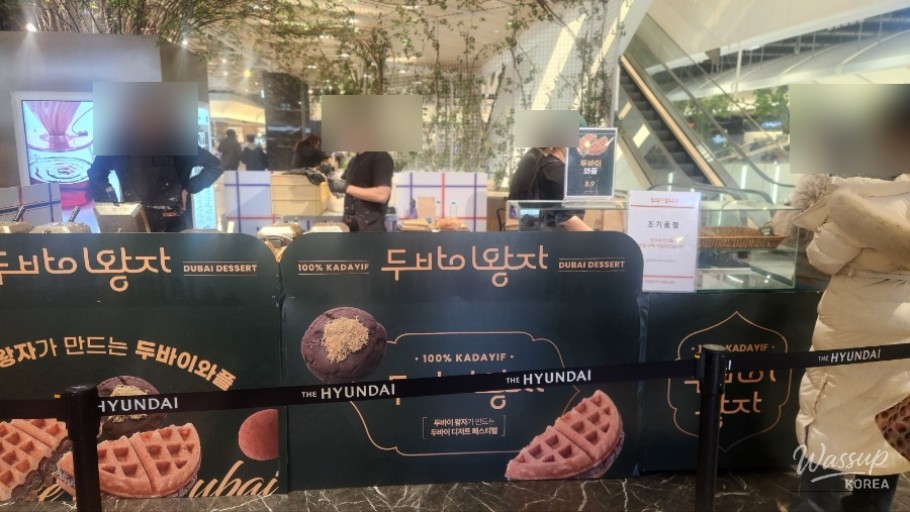 Dubai waffles and chewy cookies displayed at the Dubai Prince dessert stand