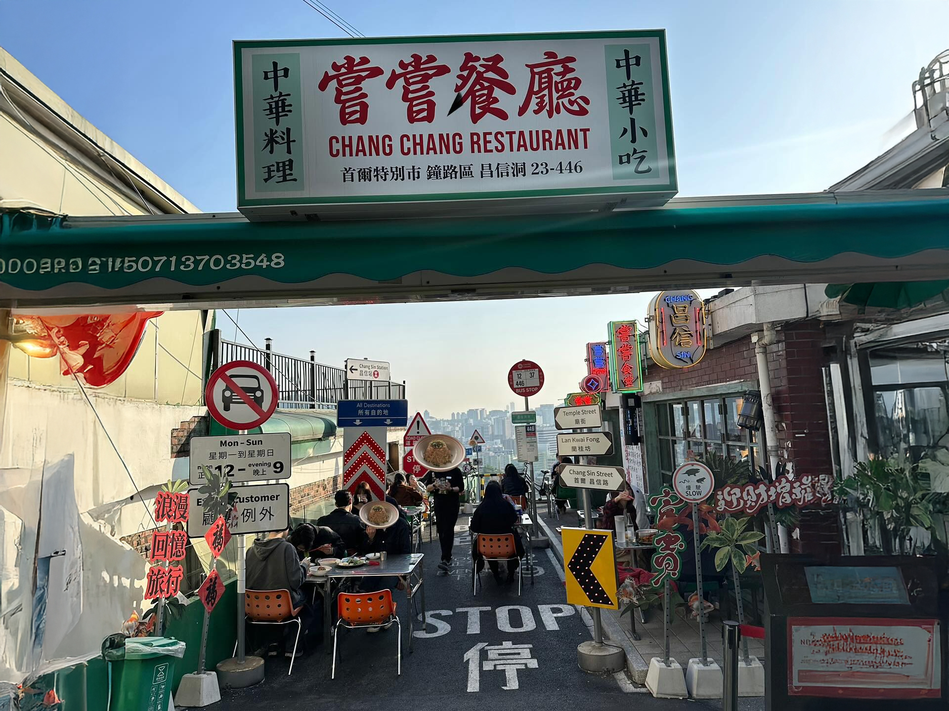 A breathtaking panoramic view of Seoul's skyline and the Naksan fortress trail from a high vantage point