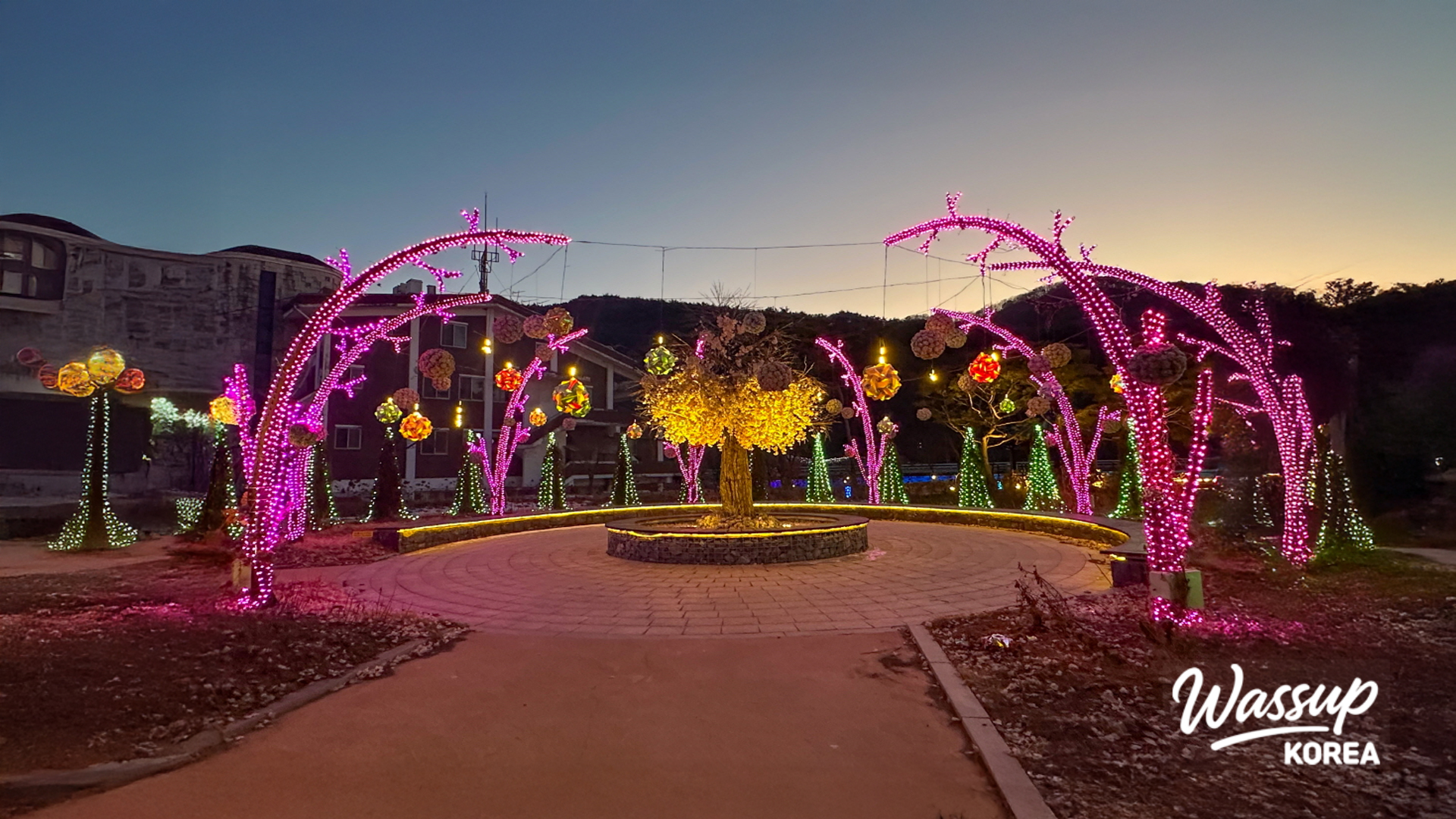 A scenic view of Goe-gang Light Park in Goesan featuring artificial rock formations and landscaping