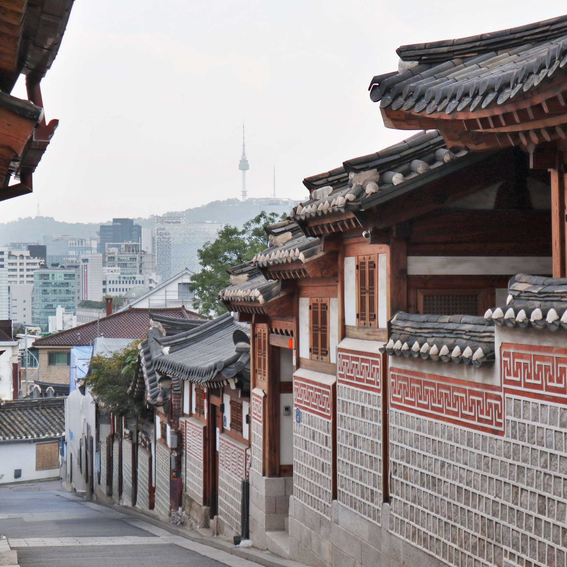 Snow-covered traditional hanok village scenery in Korea during winter