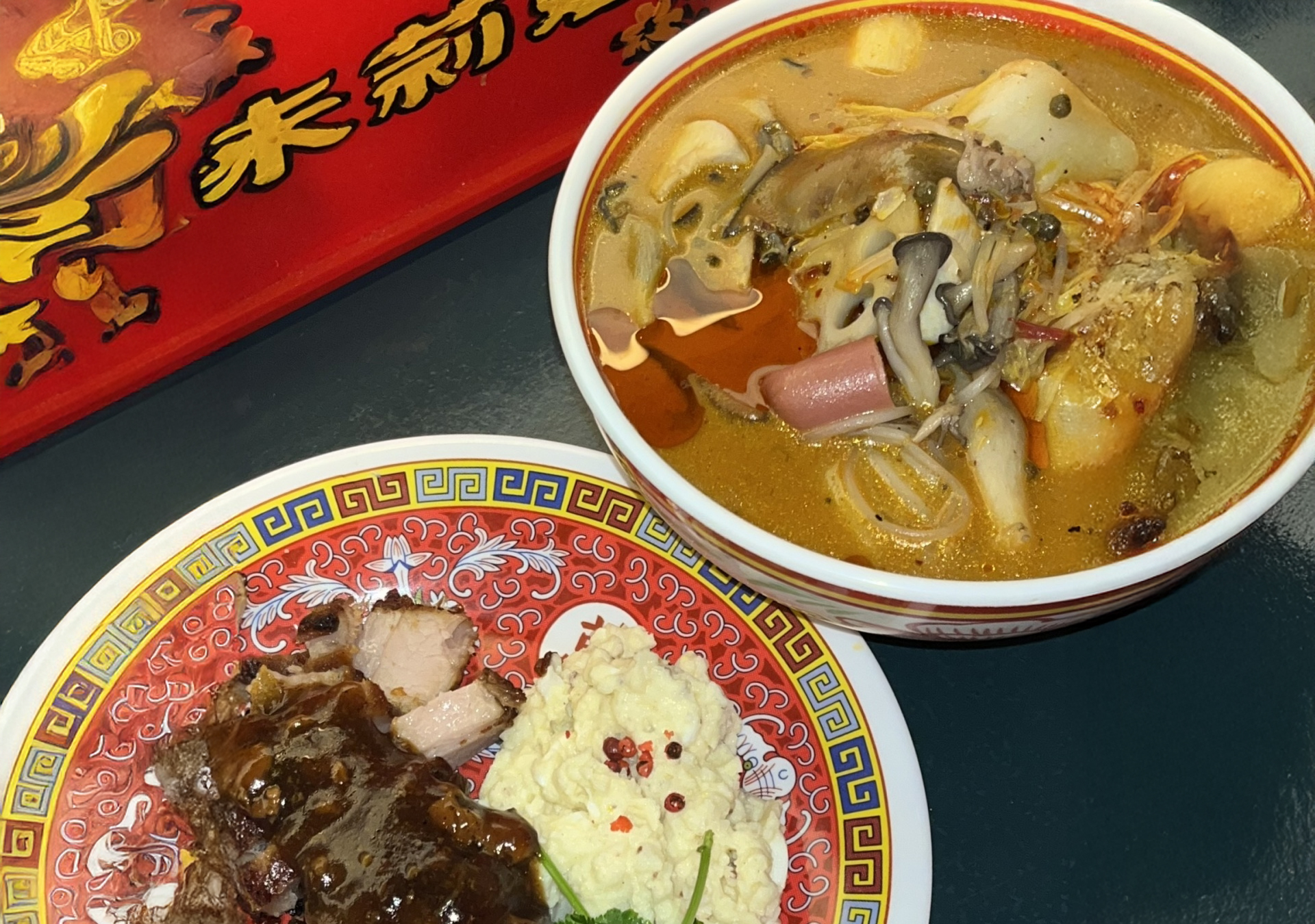 Steaming bowl of spicy Mala Soup with assorted seafood and vegetables