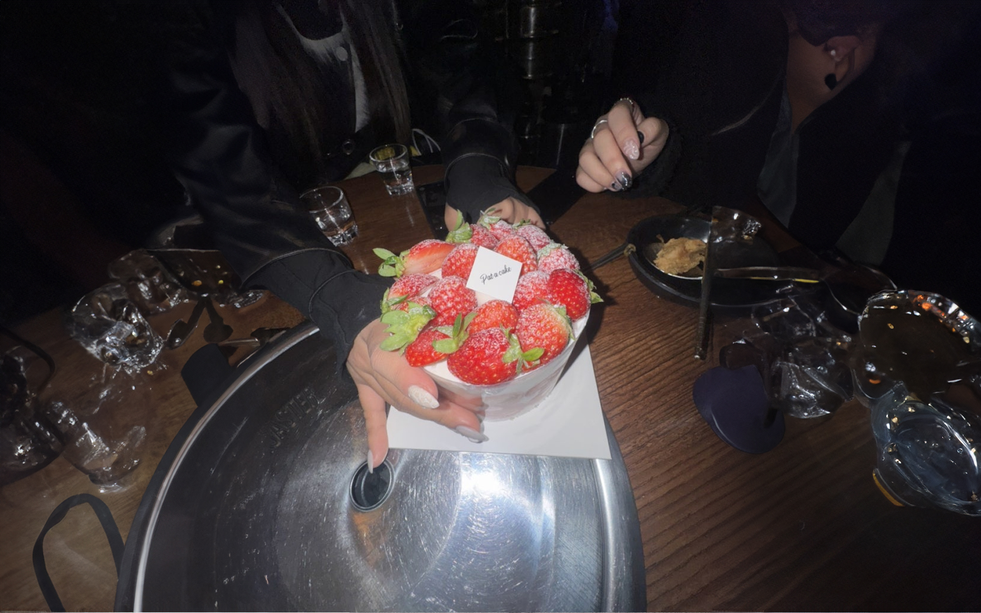 Casual night scene near a performance venue in Hongdae with diary-like moments