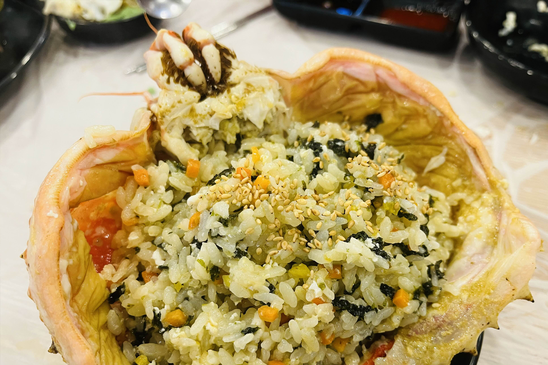 A beautiful platter of seasonal sashimi served alongside the king crab feast