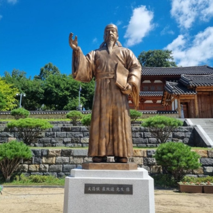A grand traditional Hanok pavilion Goun-ru under a bright blue sky at Choi Chi-won Historical Park in Hamyang