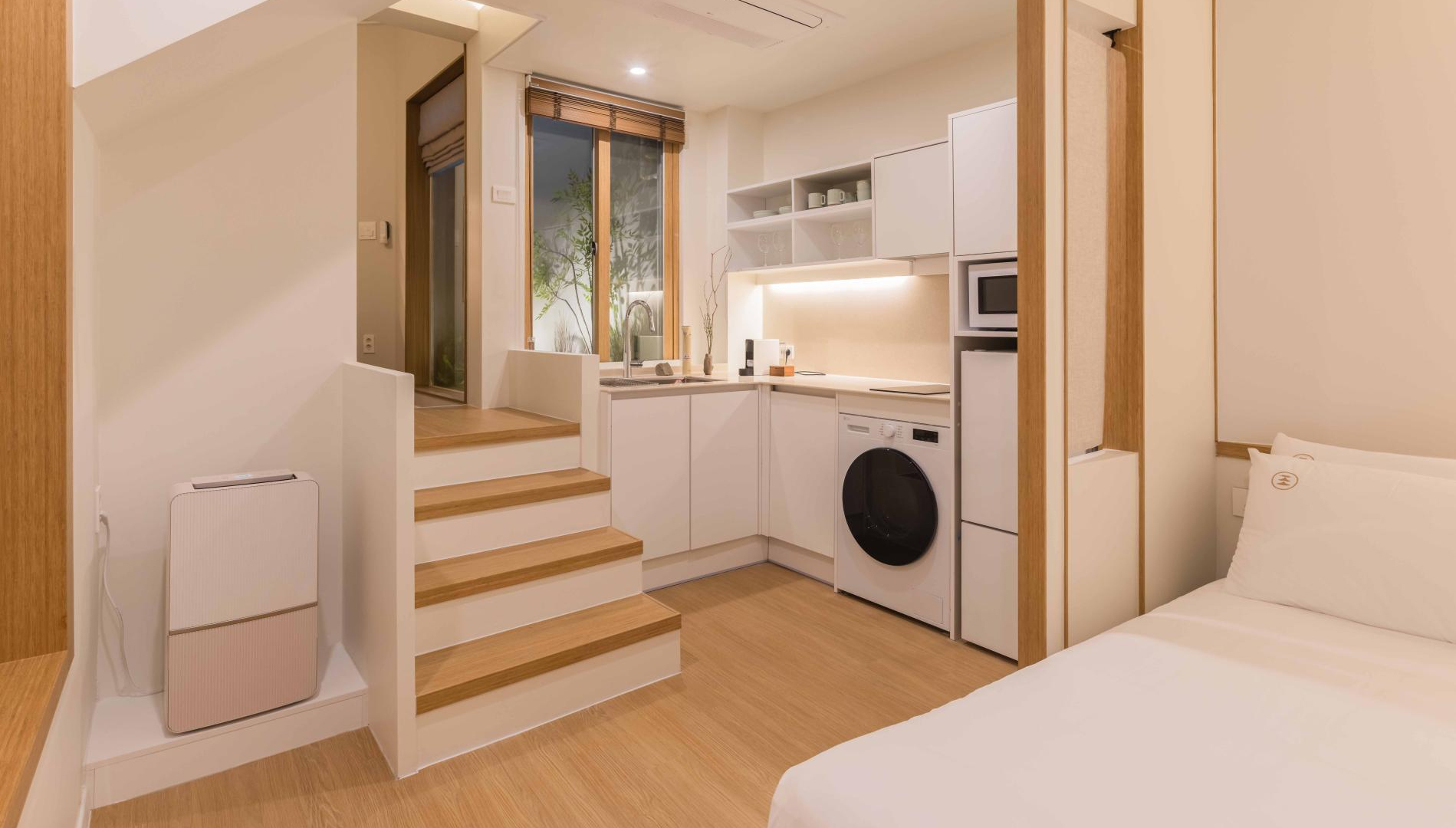 Cozy bedroom and simple bathroom layout inside Stay Yeonsum