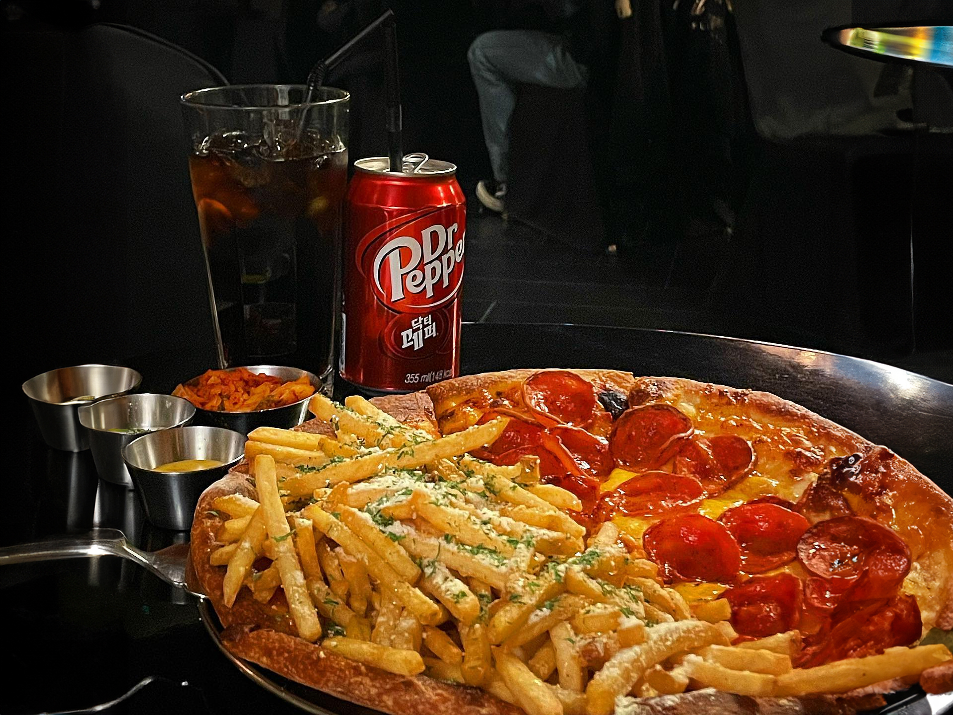 Craft beer selection served alongside pizza at Pizza Never Sleeps