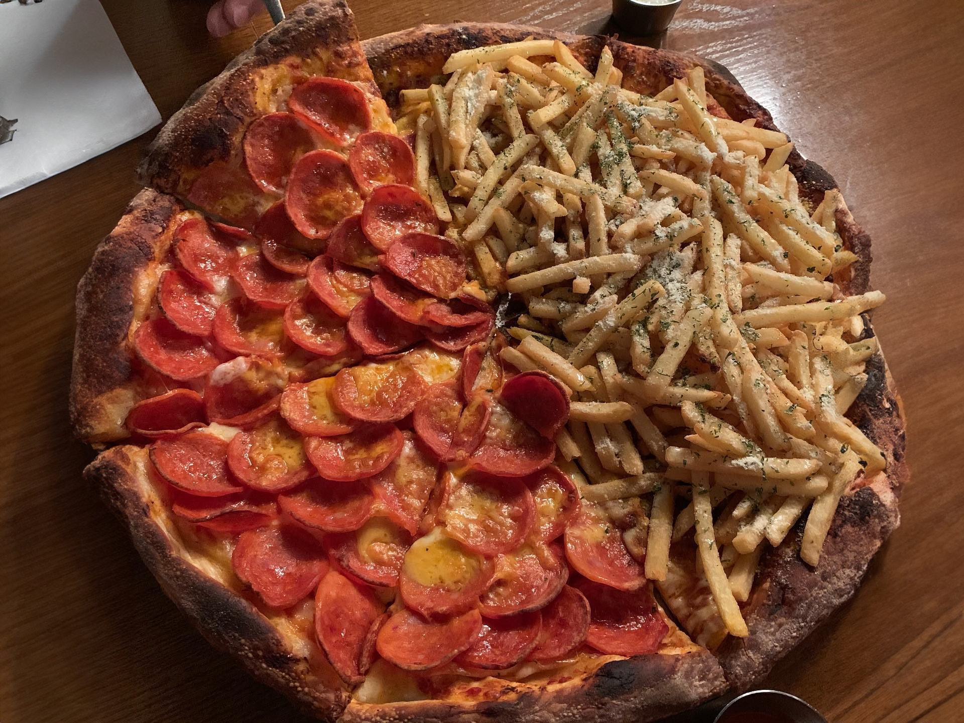 Pepperoni pizza and Beef Never Sleeps pizza served fresh at Pizza Never Sleeps